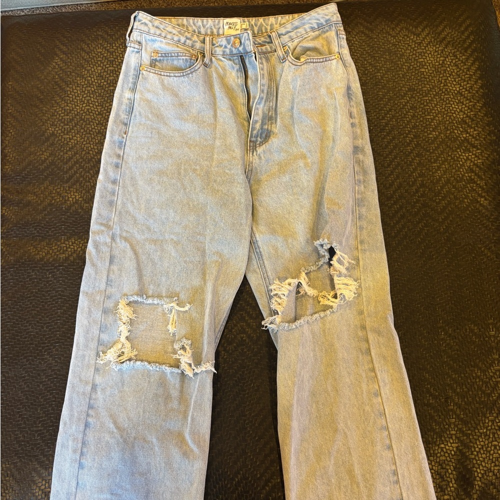 Distressed Light Blue Jeans